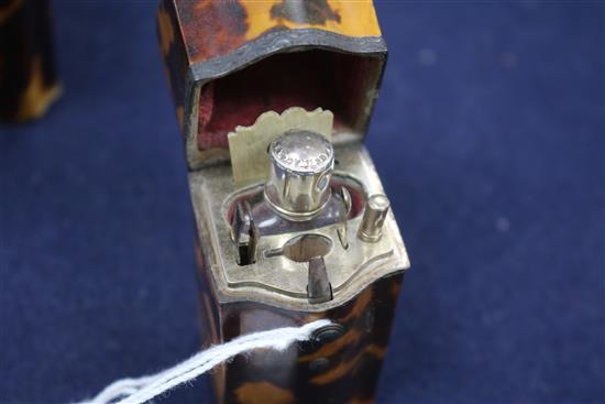 Two tortoiseshell etuis, a tortoiseshell case, a 19th century walnut snuff box and and enamel porcelain etui